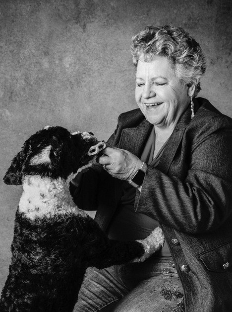Michelle Camaioni laughing with her dog